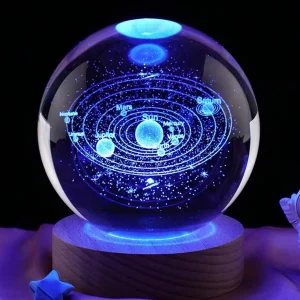 Bola de cristal con patrón de sistema solar de cielo estrellado grabado con láser en 3D