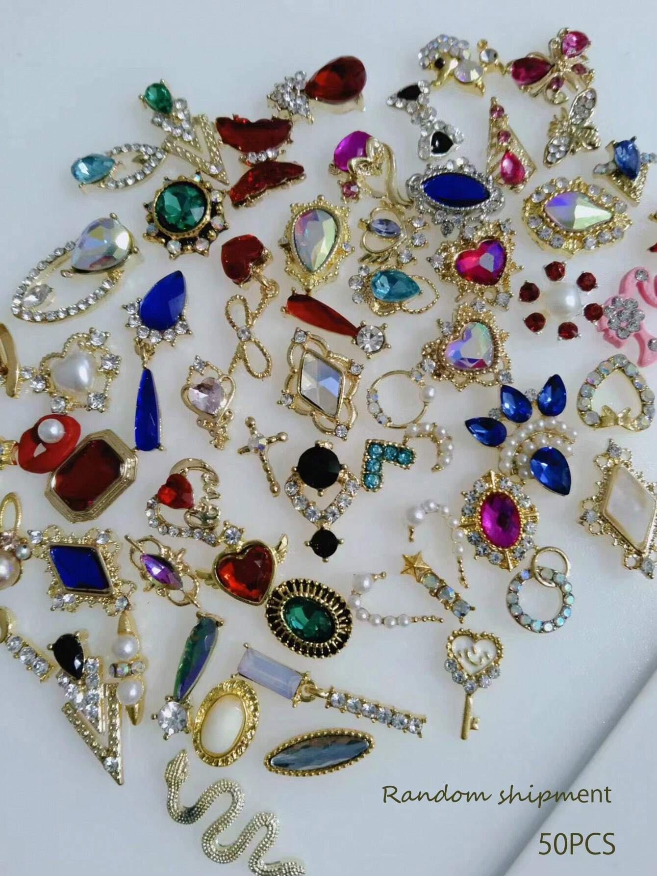 Shein 50 piezas de decoraciones de aleación para uñas de estilos y colores variados