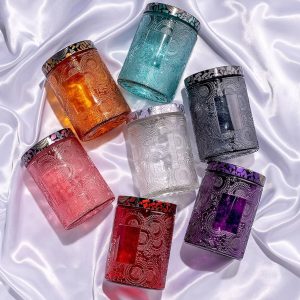 Tarro de vela de cristal con patrón de estampado de revestimiento.